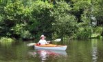 nancy loderick kayaking on river