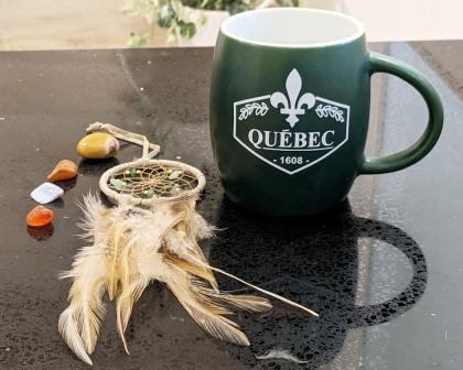 crystals, dream catcher and mug